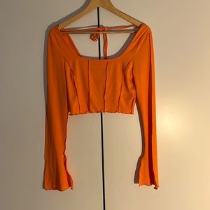Bright orange long sleeve crop top